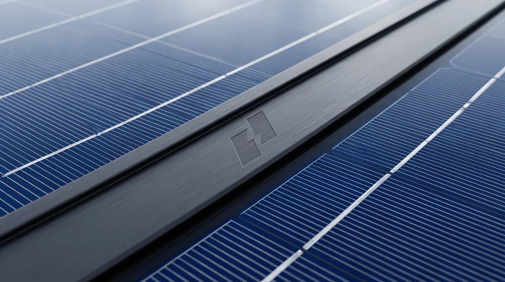 The symbol etched into a dark rail between solar panels
