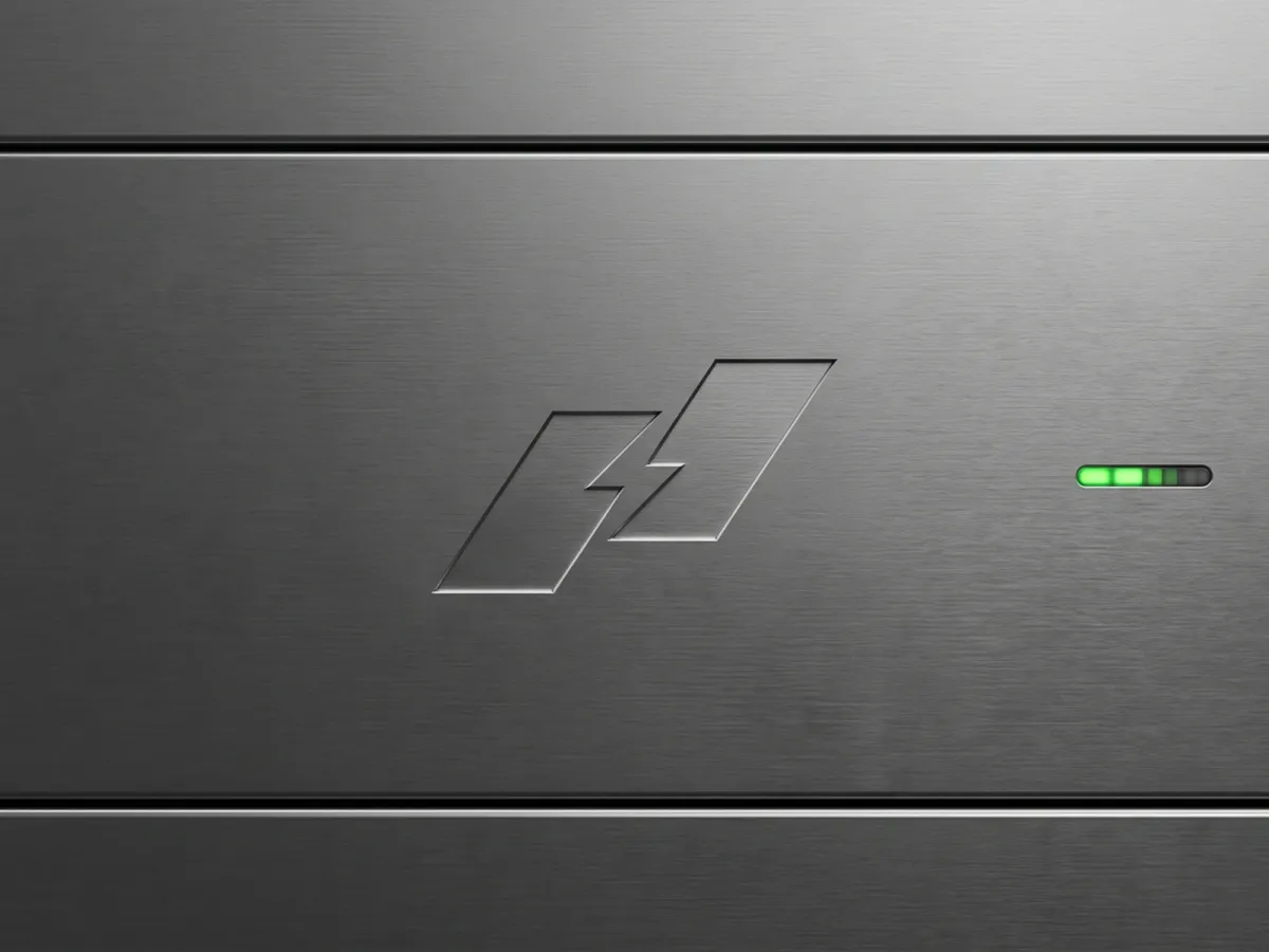 The Nexenergie logo embossed on a brushed steel server panel with a green status light